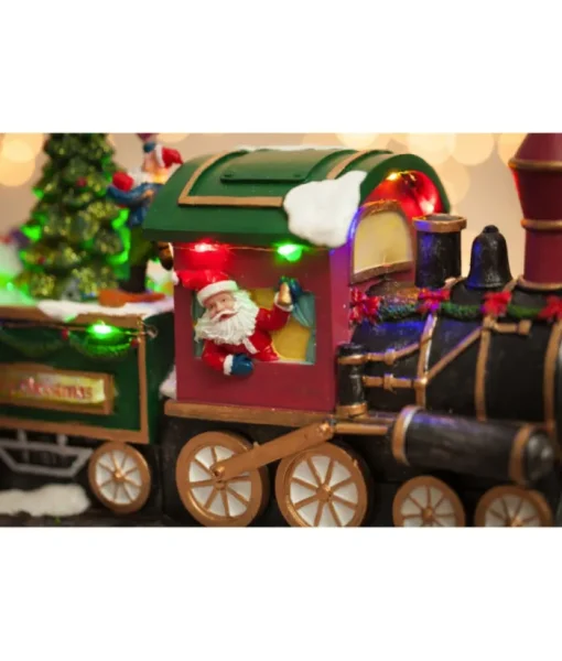 Boutique de Noël Animated And Musical Pieces*Table Ornament, Musical Train, With Santa And Elves. Measures 15 Inches.