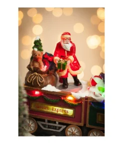Boutique de Noël Animated And Musical Pieces*Table Ornament, Musical Train, With Santa And Elves. Measures 15 Inches.